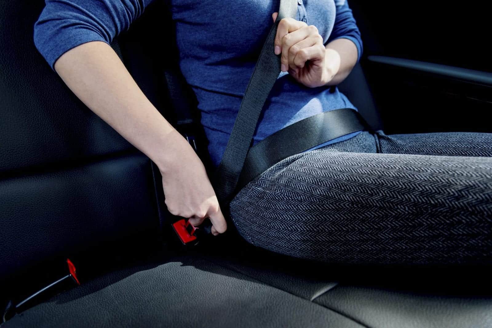 Woman Seat Belt Stock Photo
