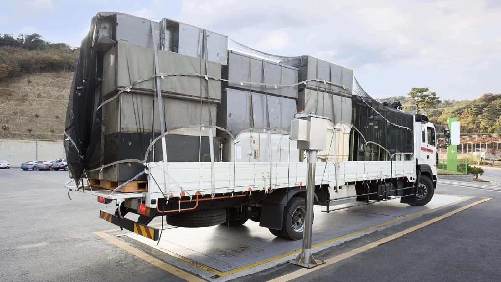 Container Truck Being Weighed Stock Photo